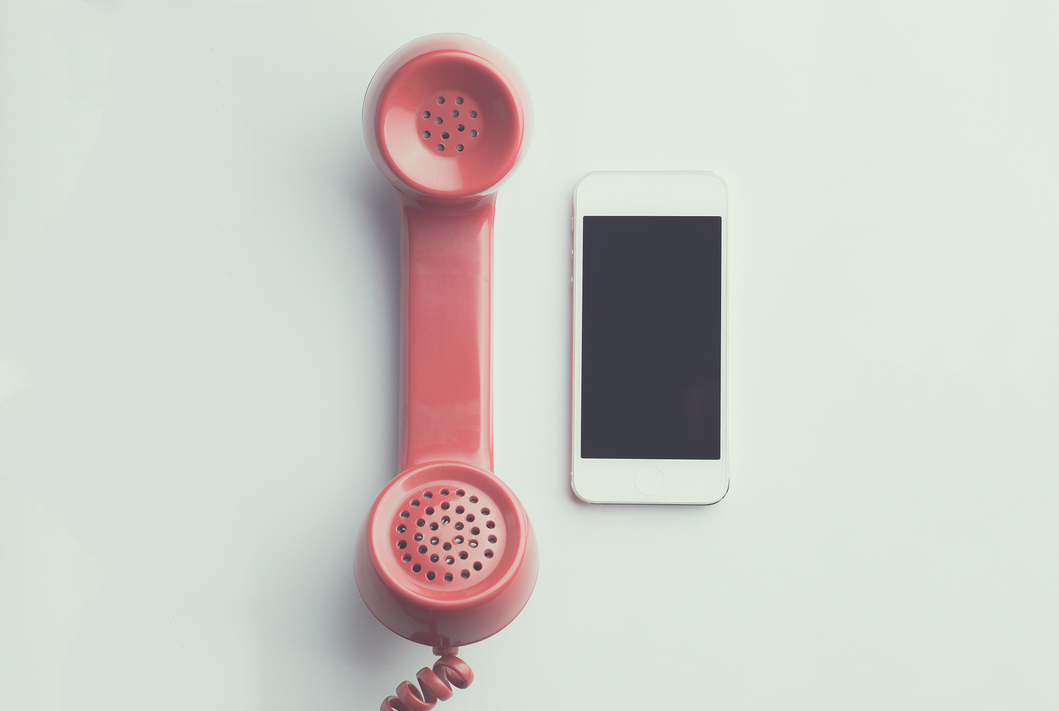 flat-lay-photography-of-red-anti-radiation-handset-telephone-beside-iphone-594452 phone_1650958599.jpeg NEOSiAM 2021 at Pexels