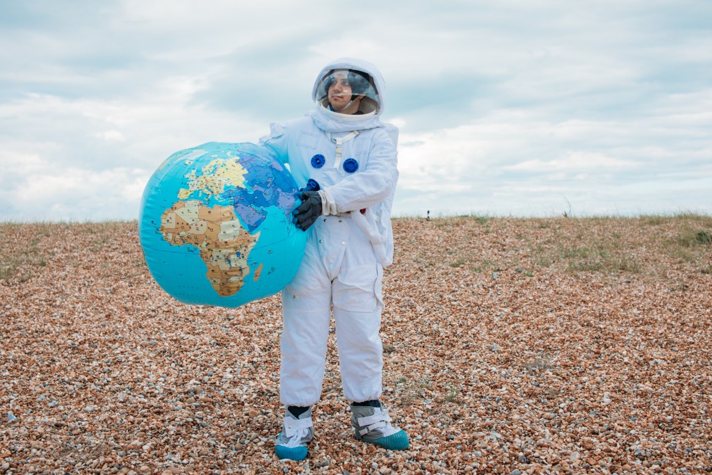 astronaut-holding-the-earth-5258255 earth_1682180658.jpeg T Leish at Pexels