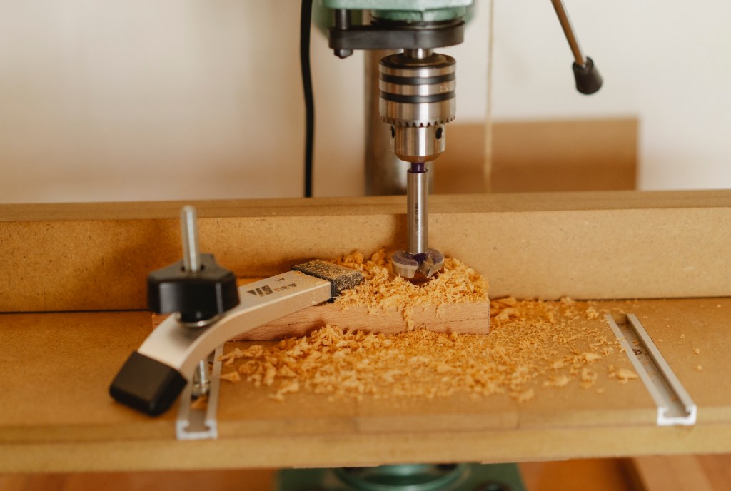 drill-press-and-clamp-with-timber-in-workroom-5974026 press_1683656890.jpeg Ono Kosuki at Pexels