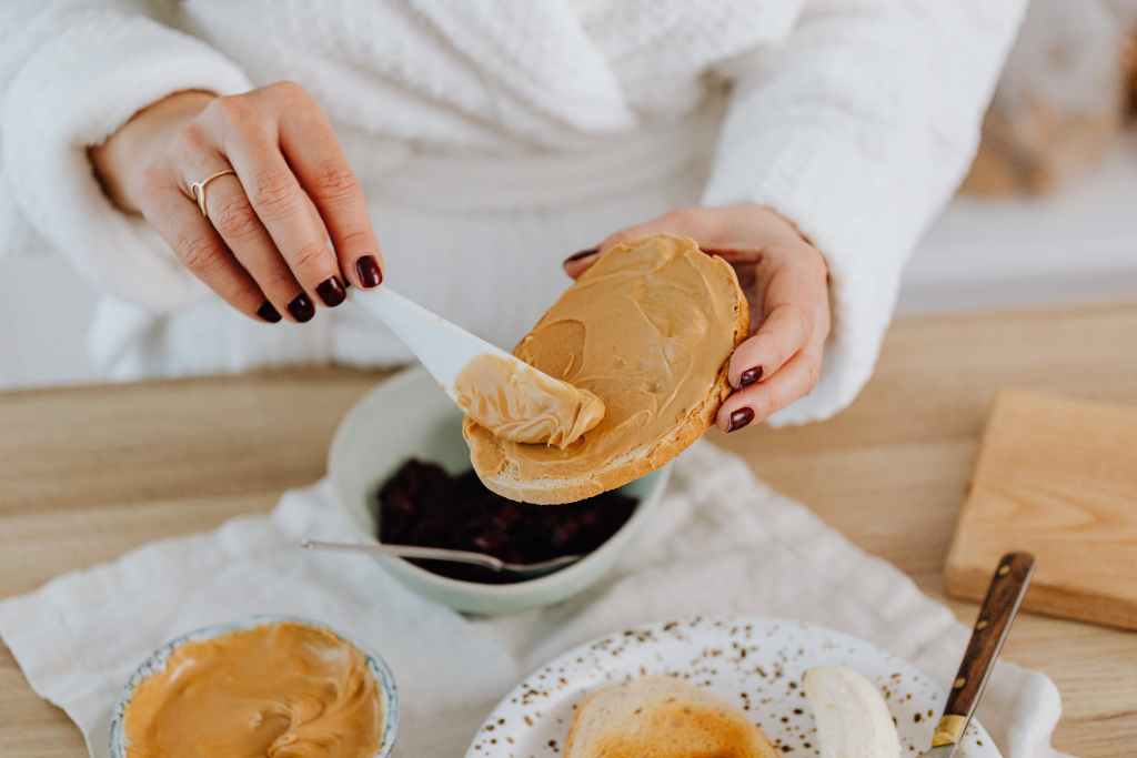 person-spreading-peanut-butter-on-toast-6659874 peanut_butter_1706318282.jpeg Karolina Grabowska at Pexels