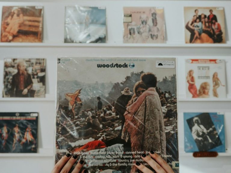 person holding Woodstock record sleeve pack.jpg