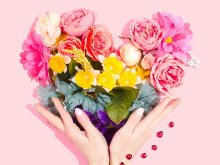 person holding bouquet of flower.jpg