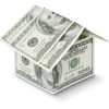 a house made out of money on a white background.jpg