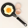 sunny side up egg on frying pan.jpg