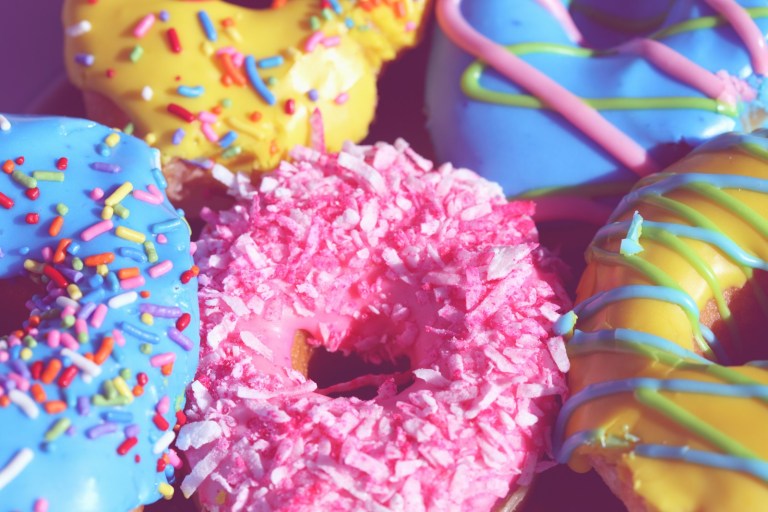 pink yellow and blue floral doughnut.jpg