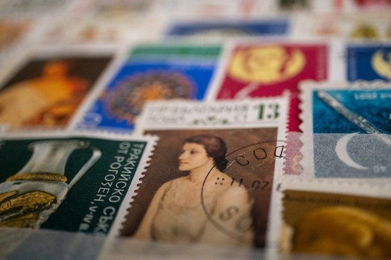 a close up of a bunch of stamps on a table.jpg