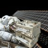closeup photo of astronaut repairing satellite.jpg