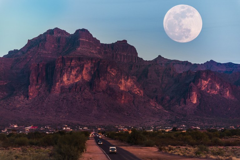 landscape photography of brown mountain under moon.jpg