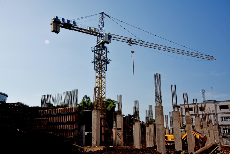 a construction site with a crane in the background.jpg