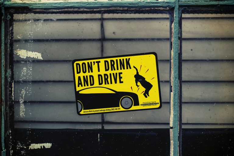 Don't Drink and Drive poster on glass panel.jpg