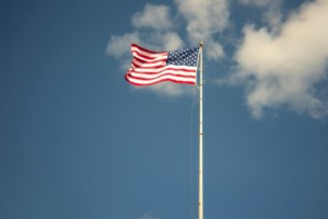 The american flag is flying high in the sky.jpg