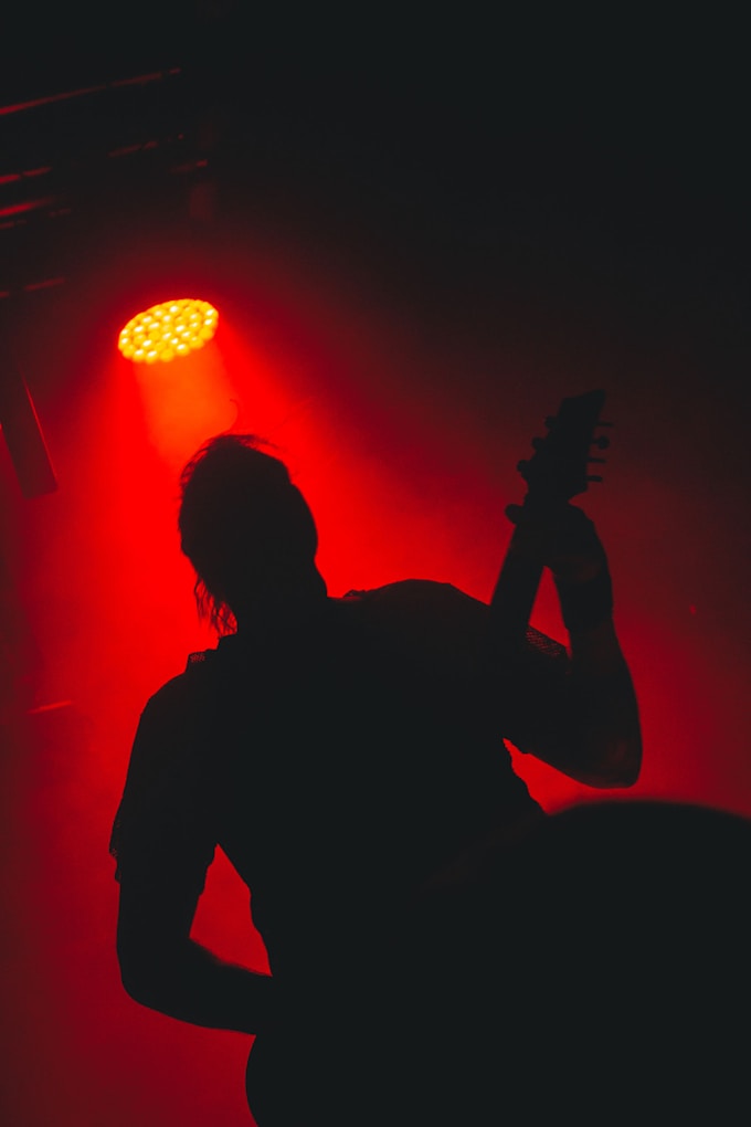 silhouette of man playing guitar.jpg