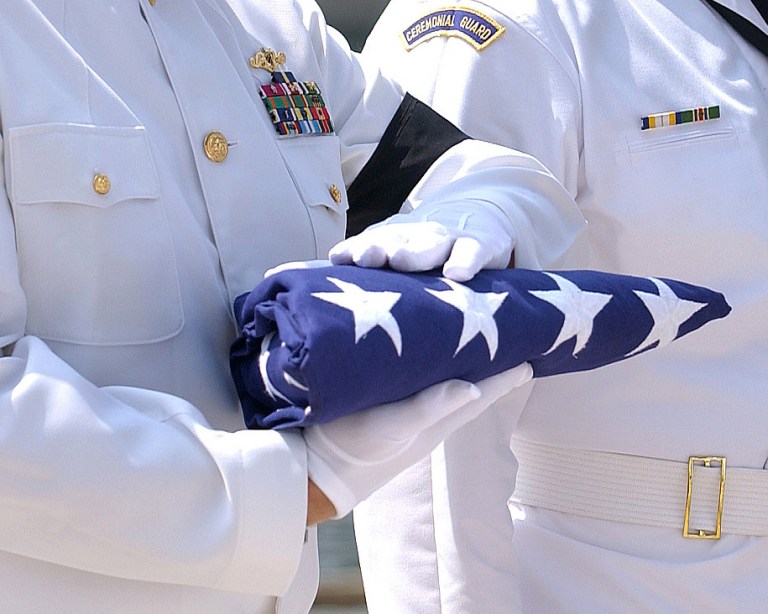 An American flag is prepared for presentation to the next of kin.jpg