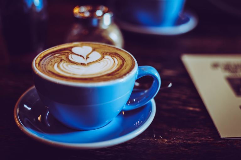 photo of blue ceramic teacup and saucer.jpg