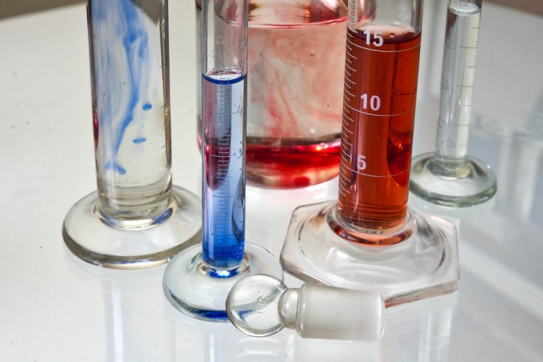 Transparent chemistry glass tubes filled with substances.jpg